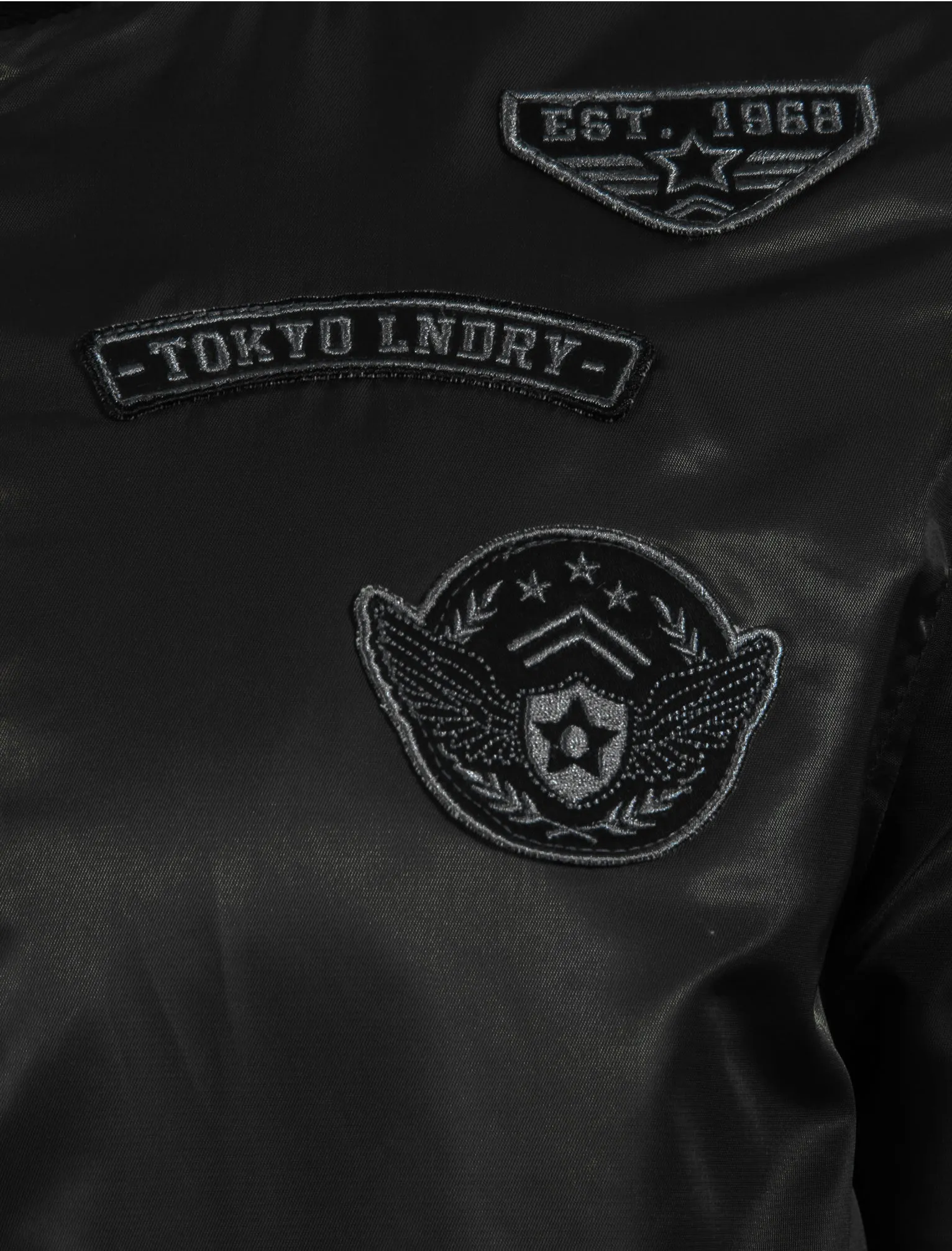 Amalfi Bomber Jacket with Flight Patches in Black - Tokyo Laundry